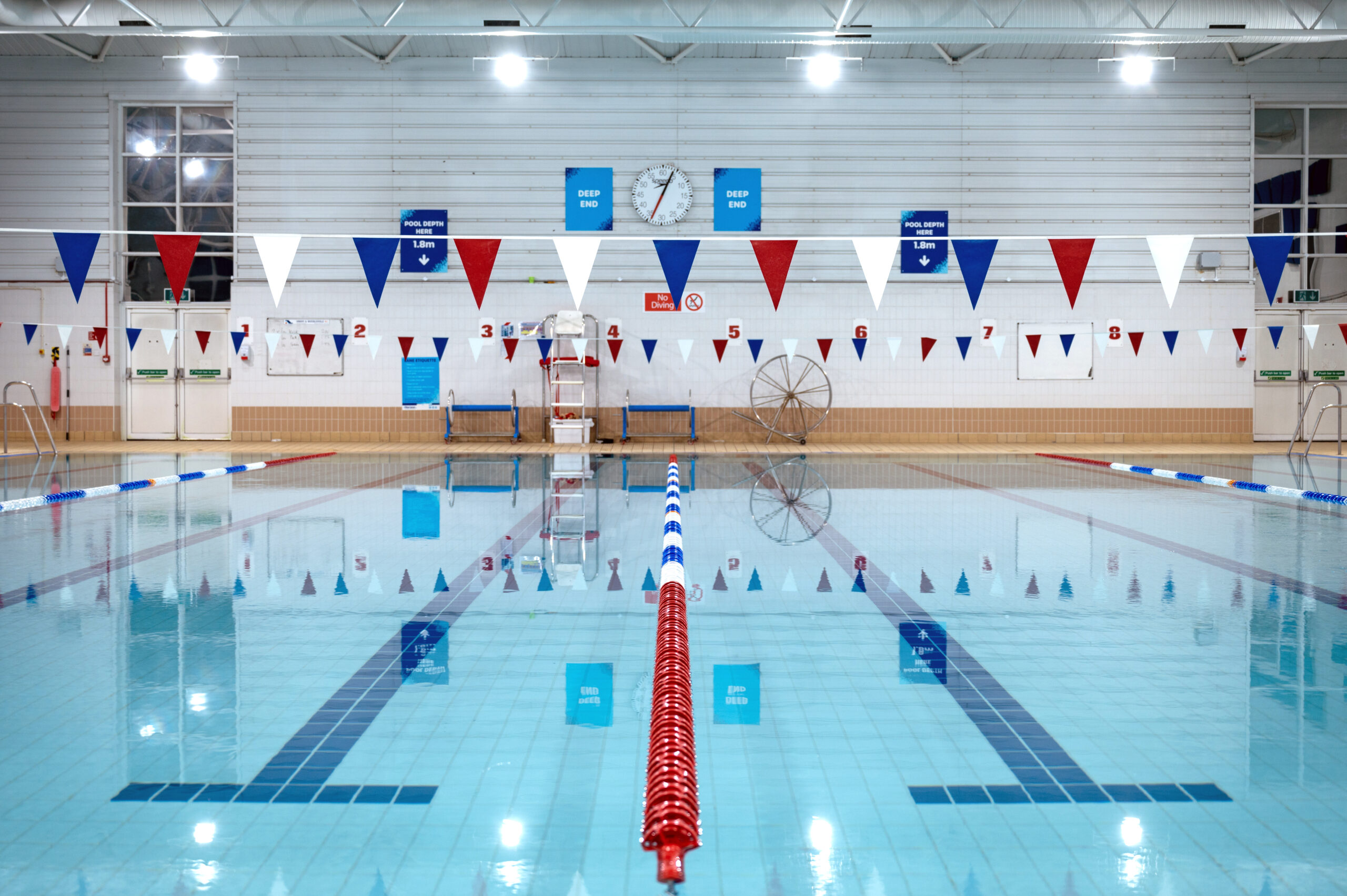 Indoor swimming pool with lane markers.